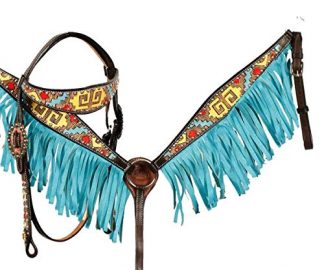Hand Painted browband headstall and breast collar set with tribal design. This set features dark brown leather with painted tribal set in yellow, red, and turquoise on headstall and breastcollar. Set is accented with orange and clear crystal rhinestones and breast collar with turquoise synthetic fringe.